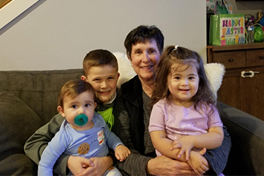 Michele and three grandchildren